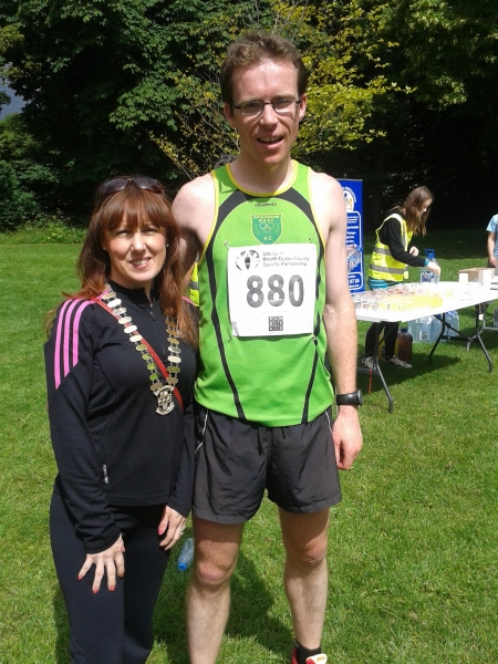 Deputy Mayor Liona O'Toole with Brian Furey the male winner of the Ramble Aid 5k/10k run in aid of the Irish Carer's Association