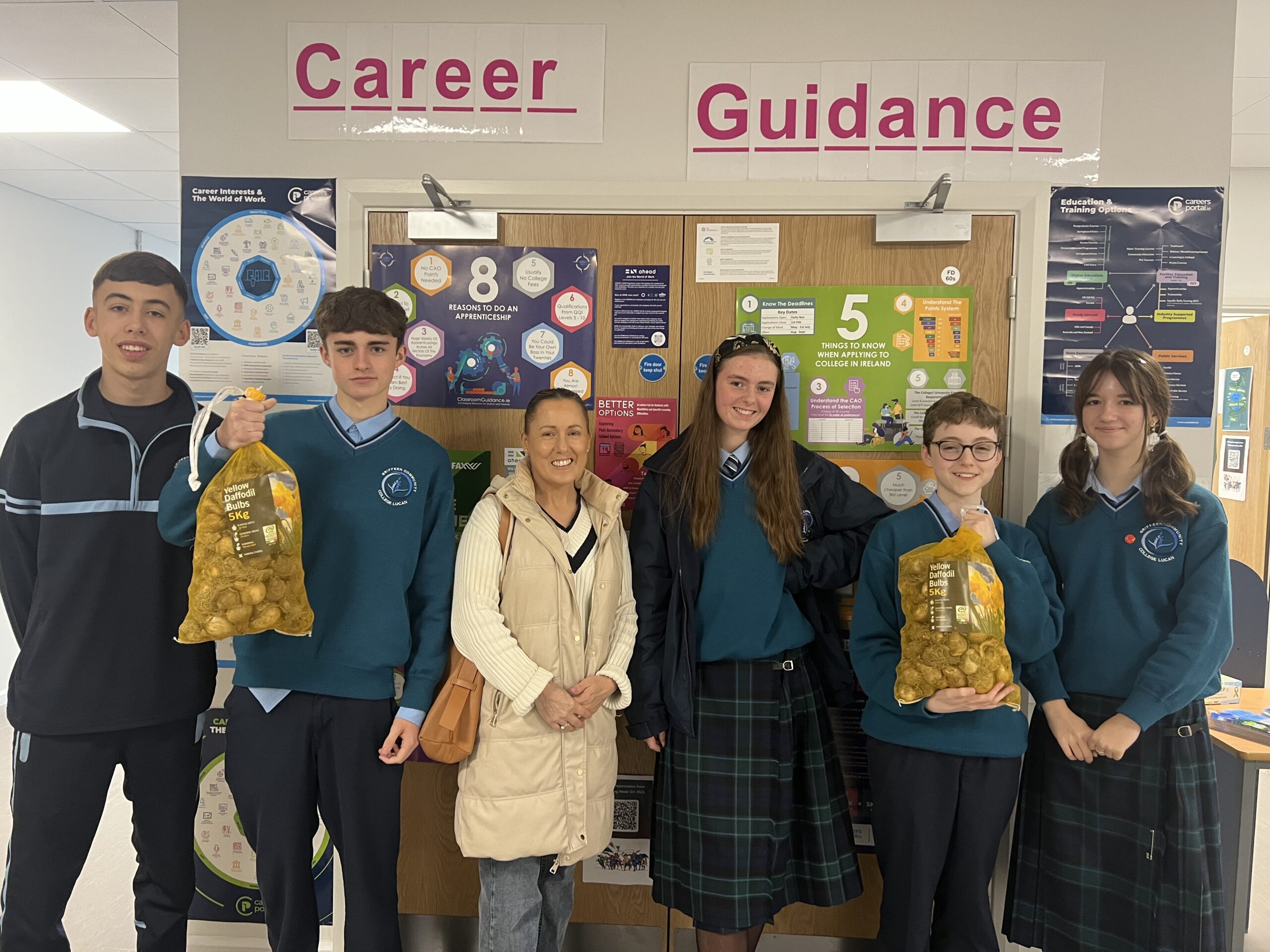 Cllr. Liona O'Toole presenting Griffeen Community College with daffodil bulbs to be planted and sold in aid of Irish Cancer Society