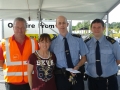 Deputy Mayor Liona O'Toole with Lucan Community Gardai at the RSA Safety event at Lucan Tesco's