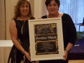 Cllr. Liona O'Toole presenting award to Geraldine Whelan at Lucan Gospel Choir event